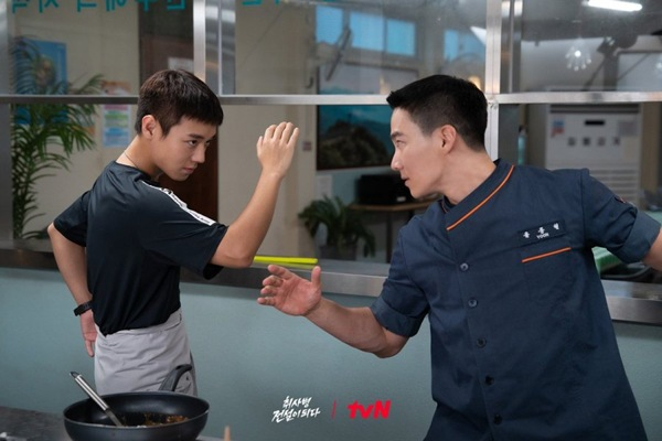 Live action gaming status window overlay scene in The Legend of Kitchen Soldier
