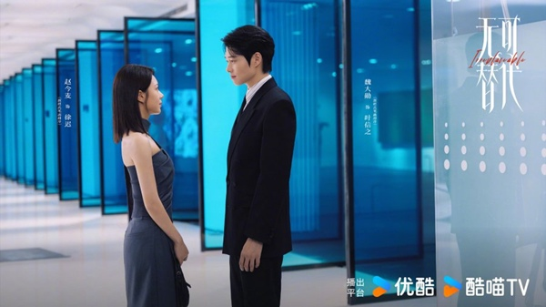 Boardroom confrontation scene featuring the cast of Irreplaceable